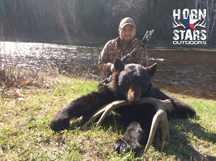 Matt Miller from Horn Stars Outdoors with 200 lb bear