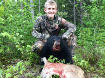 Adam tags a black bear in spring 2016