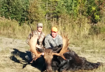 Hunter and Guide with Moose