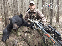 Cody, from Horn Stars Outdoors is successful bow hunting black bear