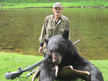 Francis first black bear hunting trip at taxis river outfitters
