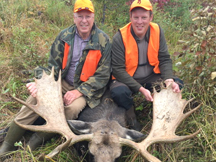 Peter and James Lutes tag out with a trophy bull